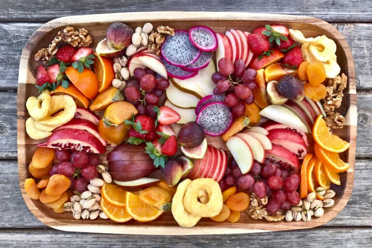 Wooden bowl of colourful fruit salad